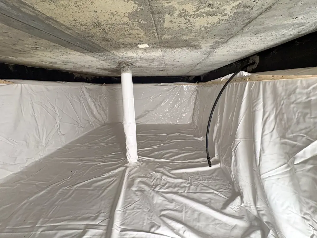 Cistern liner installation: Column sleeve in place, with a pipe penetration to the right.